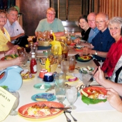 Jill Allgier heads the table at an EKURA Luncheon